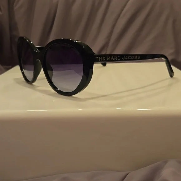 Marc Jacobs oval black Sunglasses brand new in case