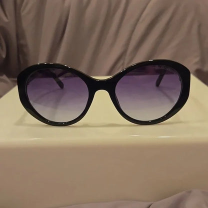 Marc Jacobs oval black Sunglasses brand new in case