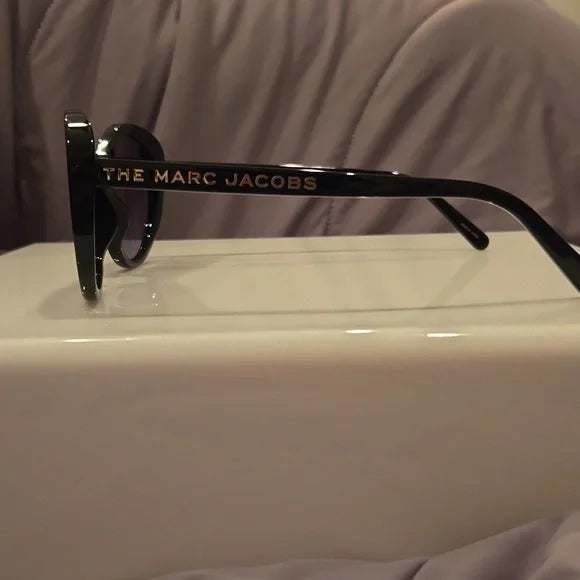 Marc Jacobs oval black Sunglasses brand new in case