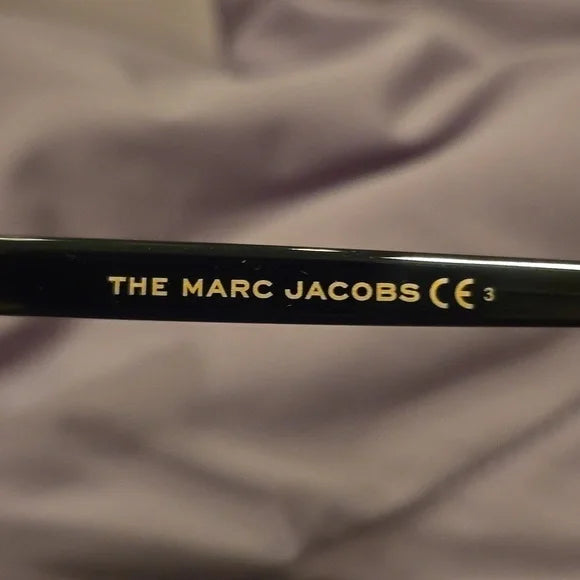 Marc Jacobs oval black Sunglasses brand new in case
