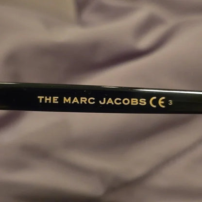 Marc Jacobs oval black Sunglasses brand new in case