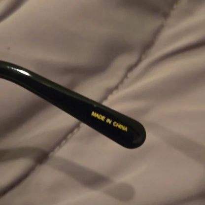Marc Jacobs oval black Sunglasses brand new in case