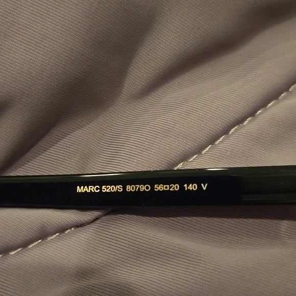 Marc Jacobs oval black Sunglasses brand new in case