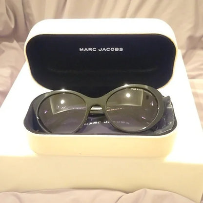Marc Jacobs oval black Sunglasses brand new in case